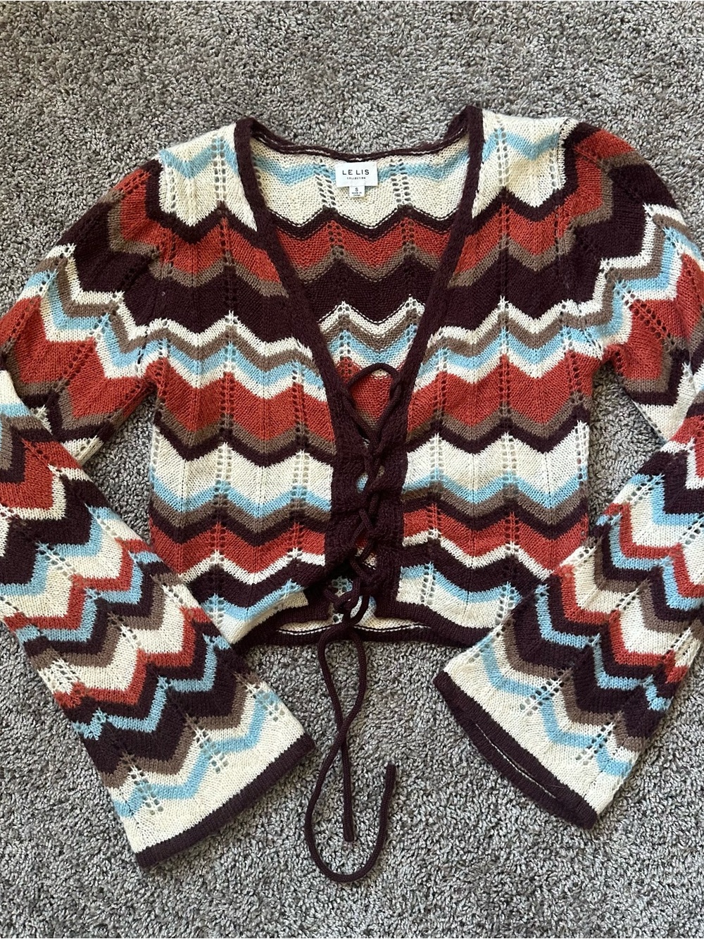 Le Lis Multicolor Chevron Lace-Up Cardigan in Cream, Rust, Burgundy & Light Blue